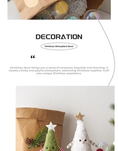 Close-up of green and white plush Christmas tree dolls with soft star topper details