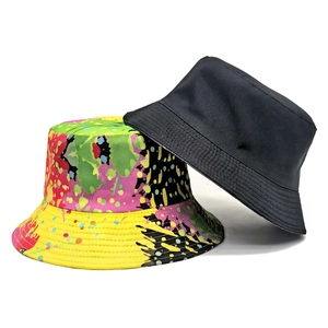 Reversible tie-dye graffiti bucket hat in black and colorful artistic print patterns