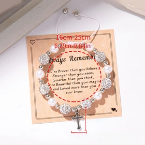 Adjustable beaded pearl bracelet with silver cross pendant on inspirational card