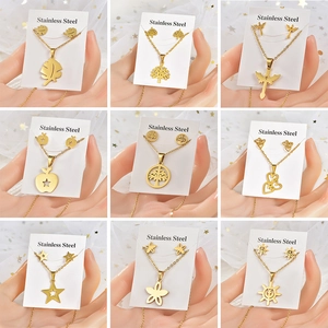 Golden stainless steel jewelry set with various geometric and animal charms