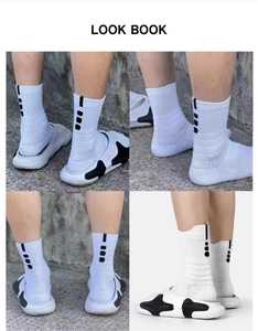 Detail view of white cushioned sports socks with black stripes for basketball
