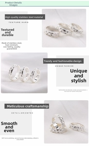Detail of silver stainless steel rings with irregular hammered texture and mirror polish