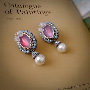 Vintage oval butterfly pearl earrings with pink stone and baroque crystal drops