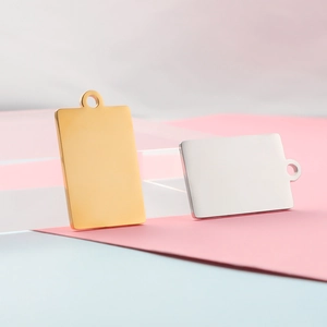 Polished rectangular stainless steel jewelry pendants in gold and silver finishes