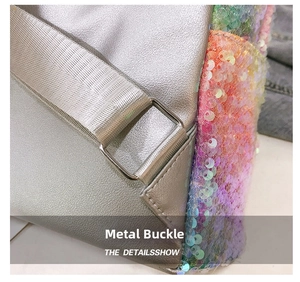 Close-up of metallic leather strap with silver square buckle on sequined unicorn backpack