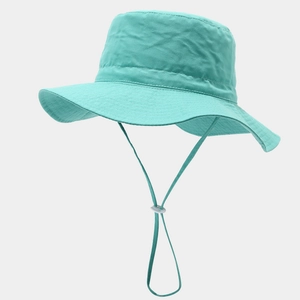 Detail of lake green sun hat featuring adjustable windproof rope and durable cotton fabric