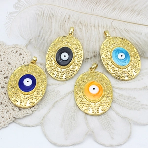 Set of four 18K gold plated oval evil eye pendants in blue black orange and cyan colors