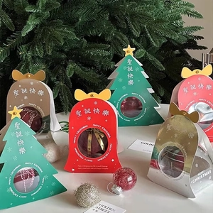 Christmas tree and bell-shaped gift boxes with window display for apples and candies