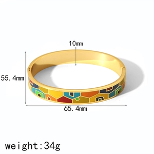Detailed size specifications for the 10mm wide gold enamel bangle showing 65.4mm diameter