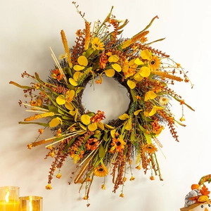 Couronne de récolte d'automne avec tournesols et marguerites pour décoration murale