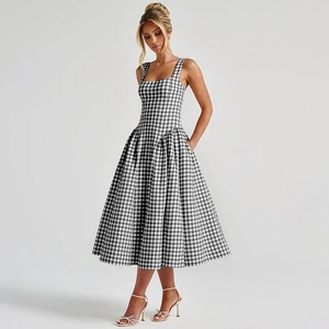 Detail view of black and white gingham sleeveless dress with square neckline and A-line skirt