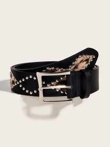 Detail of leopard print leather belt with silver studs and a square metallic buckle