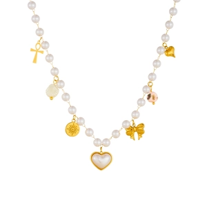 Faux pearl necklace with gold shell heart and sun pendants on a clean white background