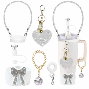 DIY tumbler decoration set with rhinestone handle and heart keychain on white background