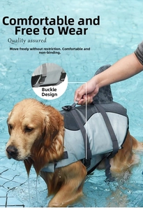 Detail of dog life jacket featuring a shark fin design and a heavy-duty rescue handle