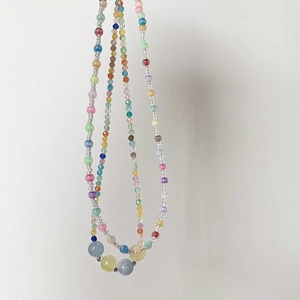 Handmade rainbow beaded necklace with colorful cat eye stones and glass beads for summer