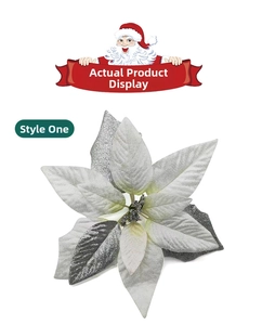 Fleur de Noël artificielle argentée avec paillettes et détails de nervures