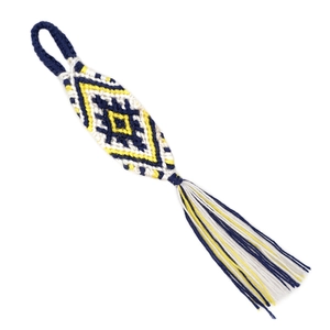 Ethnic boho woven keychain with blue diamond pattern and tassels on a white background