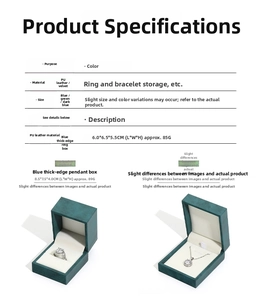 Detail view of teal PU leather jewelry boxes for rings and pendants with velvet lining