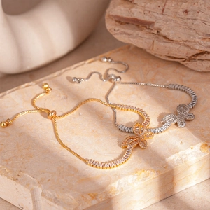Eleganti bracciali a farfalla con zirconi in finiture color oro e argento