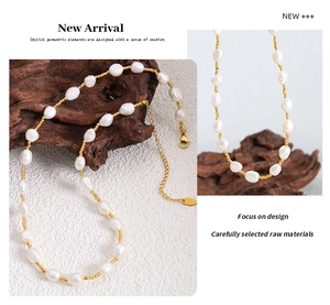 Detailed macro view of baroque freshwater pearls and golden stainless steel beads on a necklace