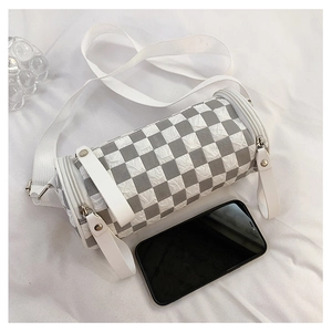 Mini checkered cylinder bag with pleated texture shown next to a smartphone for scale