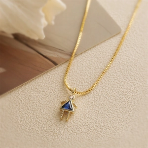 Gold pendant necklace featuring a girl silhouette with a triangular blue zircon stone