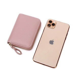 Pink lychee grain RFID leather card wallet with zipper, size comparison with smartphone