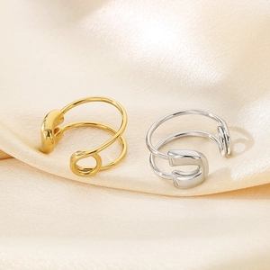 Unique safety pin design open ring in gold and silver finish over silk fabric