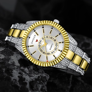 Macro shot of two-tone quartz men's watch with rhinestone bezel on black rock
