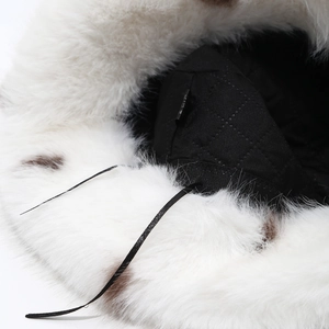 Women's leopard print faux fur bucket hat with warm quilted lining and adjustable drawstring
