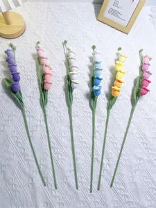 Handcrafted crochet lily of the valley flowers in various vibrant colors for home decor