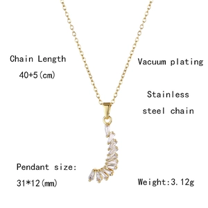 Detail showing gold crescent moon pendant with zircon stones and stainless steel chain