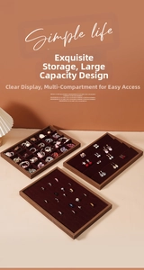 Three-piece walnut jewelry tray set with deep red velvet lining for rings and earrings