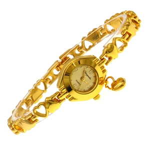 Detailed view of golden heart-shaped quartz bracelet watch with elegant link band