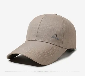 Detailed side view of khaki baseball cap with FS FASHION text and reinforced stitching