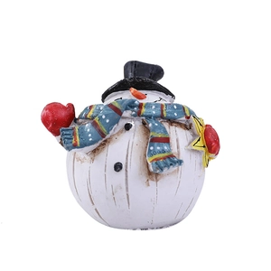 Christmas snowman resin figurine with black hat and blue polka dot scarf on white background