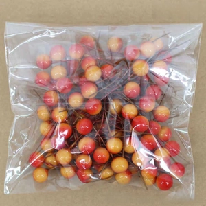 Detail of 100pcs artificial red-yellow gradient berries with stems for DIY decor