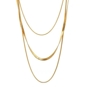 Triple layered gold titanium steel necklace featuring flat herringbone and snake chains