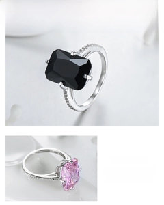 Detailed macro of emerald cut black and pink zircon rings in S925 sterling silver
