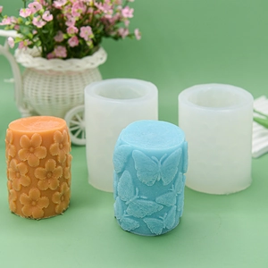 Cylindrical silicone candle molds with 3D embossed butterfly and flower patterns
