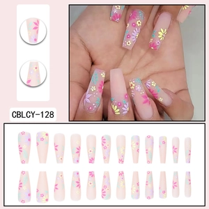 Long ballerina press-on nails with colorful floral patterns on nude pink gradient base