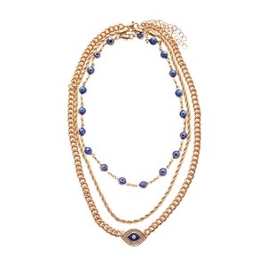 Three-layer gold necklace with devil's eye charms and sparkling rhinestones
