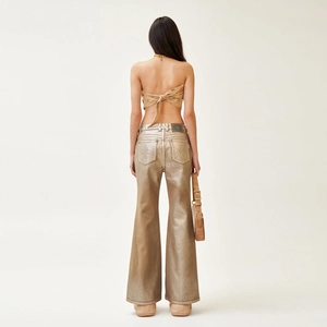 Women's chic metallic champagne gold flare trousers and tube top set back view