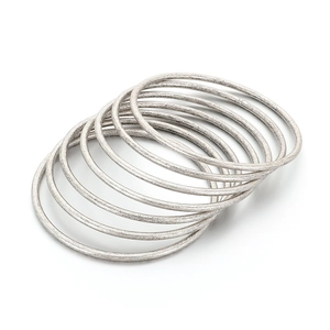 Minimalist stackable 3mm silver stainless steel bangles set with brushed metal texture