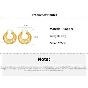 Detail view of 18k gold plated woven earrings showing 3x3cm size and copper texture