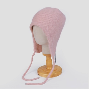 Rosafarbene Angora-Pelzmütze mit Ohrenklappen und Strickbändern für den Winter