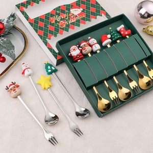 Christmas spoon and fork set with silicone Santa and reindeer toppers in a festive gift box