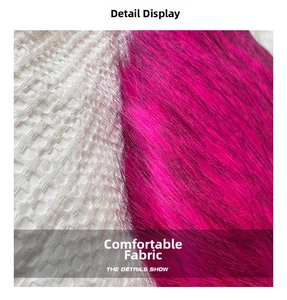 Detailed macro view of white waffle texture fabric and premium pink faux fox fur material