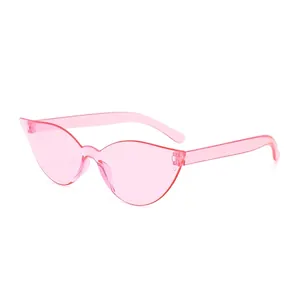 Pink translucent cat-eye sunglasses with trendy oversized frames and silver metal hinges